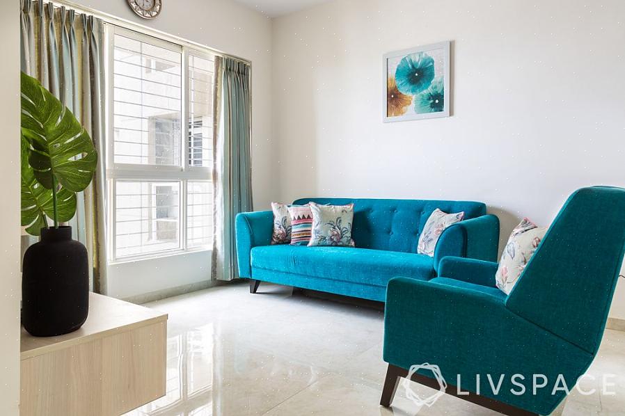 Det lilla vardagsrummet i denna lyxiga London-lägenhet designad av David long designs är en symbol
