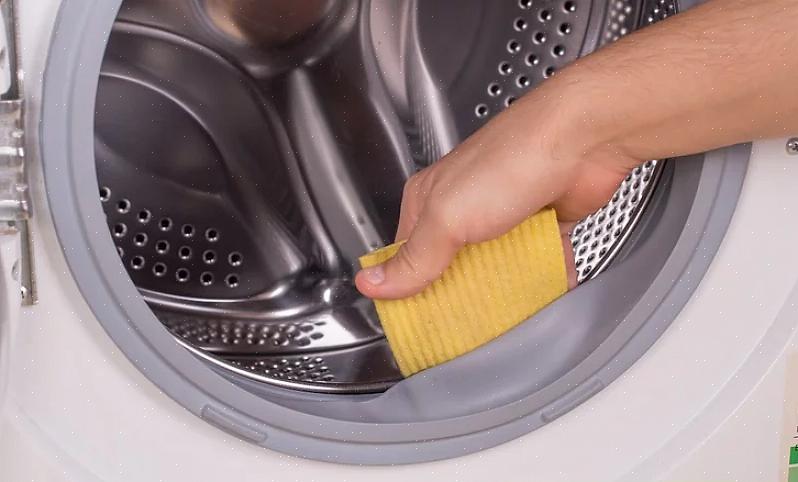 Torka av tvättmaskinens utsida med vinäger eller din favoritrengöringsmedel
